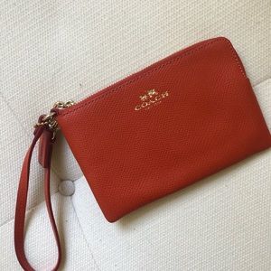 Orange Coach Wristlet